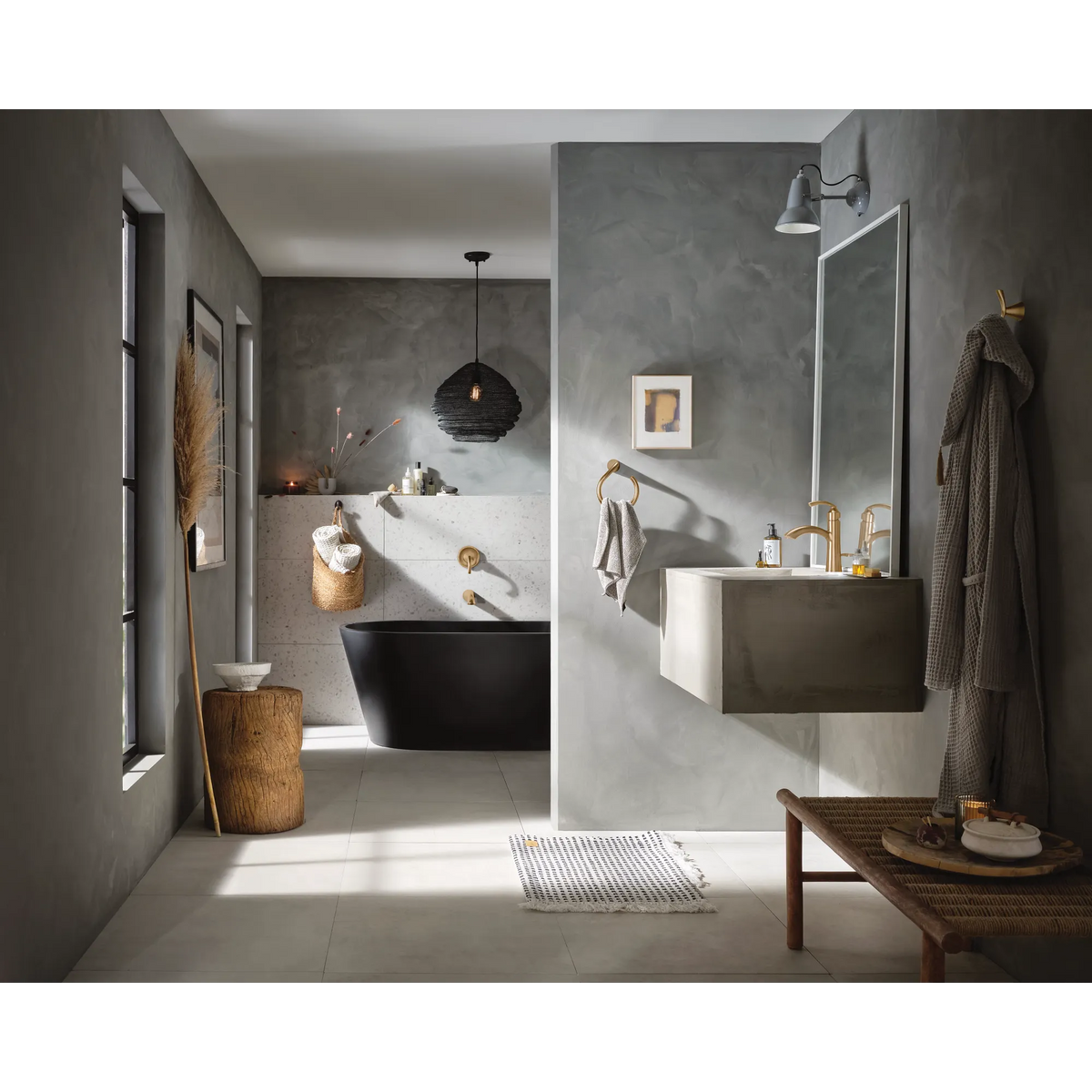 Moen WT371BZG Glyde Bronzed gold one-handle non diverter tub filler shown installed